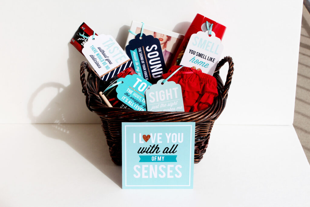 A basket filled with five senses-themed anniversary gifts for him - dateyourspouse.com A basket filled with anniversary gifts for him that are all about the five senses. | The Dating DIvas