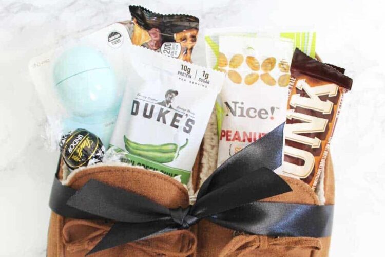 Anniversary gifts for him inside of comfy slippers - dateyourspouse.com Brown suede slippers full of anniversary gifts for him. | The Dating Divas