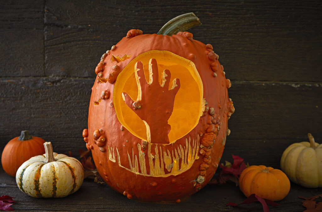 Pumpkin Carving Inspiration - dateyourspouse.com Hand reaching out for Halloween. | The Dating Divas