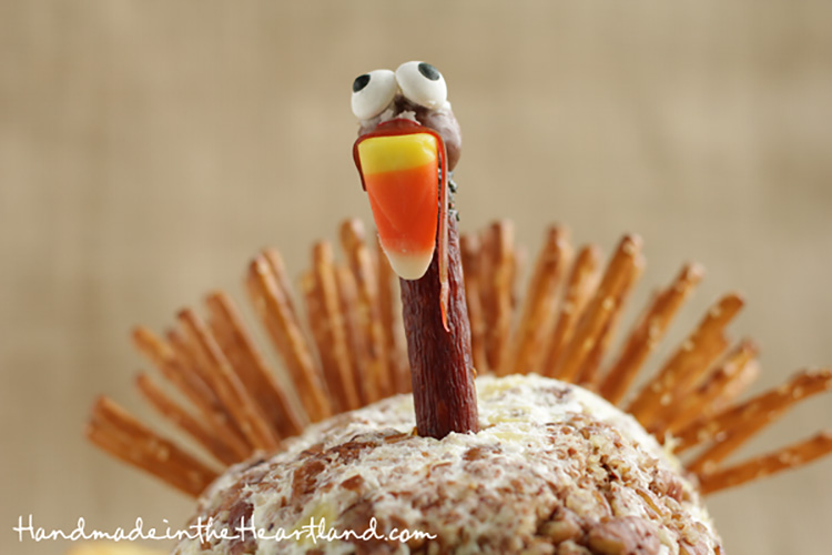 Thanksgiving Cheeseball in Turkey Shape - www.TheDatingDivas.com Make your guests smile with this turkey-shaped Thanksgiving cheeseball. | The Dating Divas