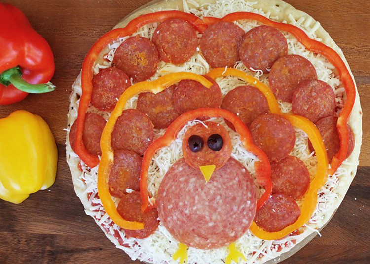Thanksgiving Food Ideas for Pizza - www.TheDatingDivas.com Make some untraditional Thanksgiving food ideas like this turkey pizza. | The Dating Divas