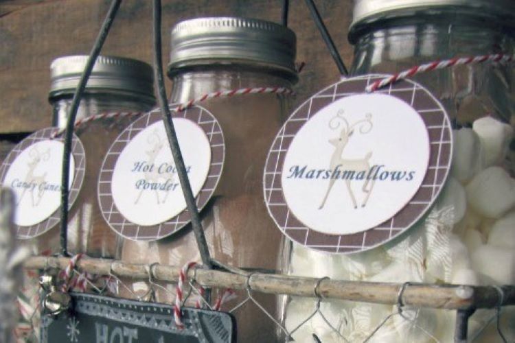 A basket filled with hot cocoa bar ingredients - dateyourspouse.com Hot cocoa bar ingredients in glass bottles | The Dating Divas