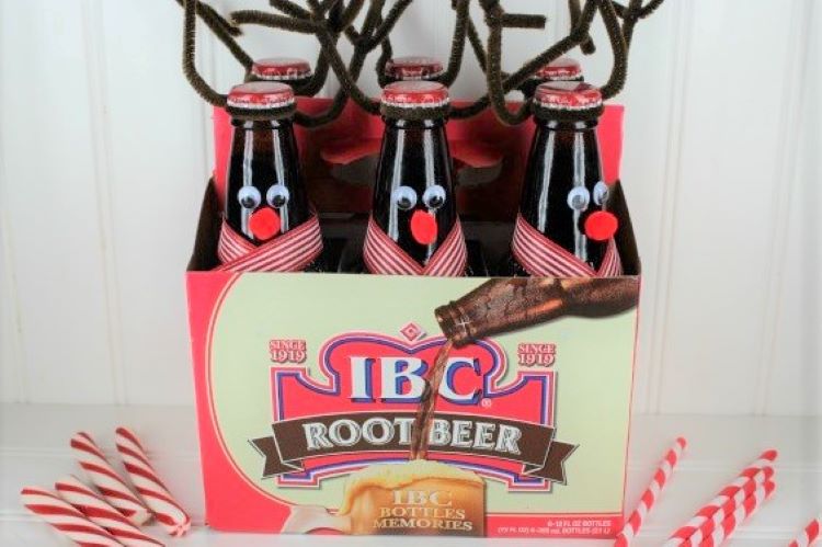 A pack of reindeer themed root beer - dateyourspouse.com A case of rootbeer dressed up like Santa's reindeer | The Dating Divas