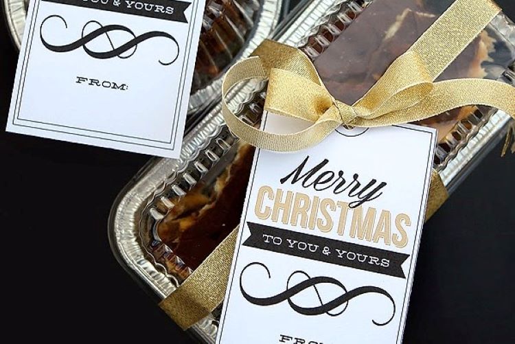 A set of printable gift tags attached to Christmas goodies - dateyourspouse.com A beautiful Christmas gift tag printable that's tied to some baked goods | The Dating Divas