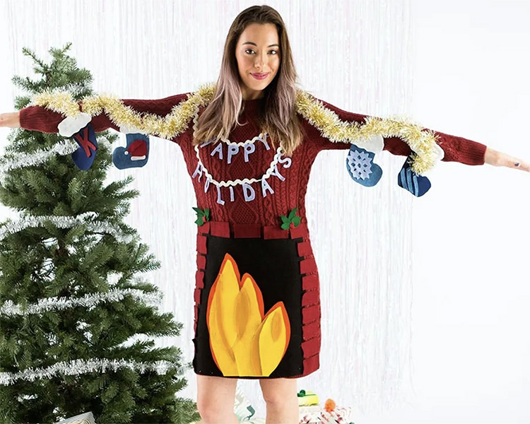 Fireplace and mantel ugly sweater idea - www.TheDatingDivas.com DIY Fireplace Ugly Sweater Dress That Uses Your Arms as the Mantel for Stockings | The Dating Divas
