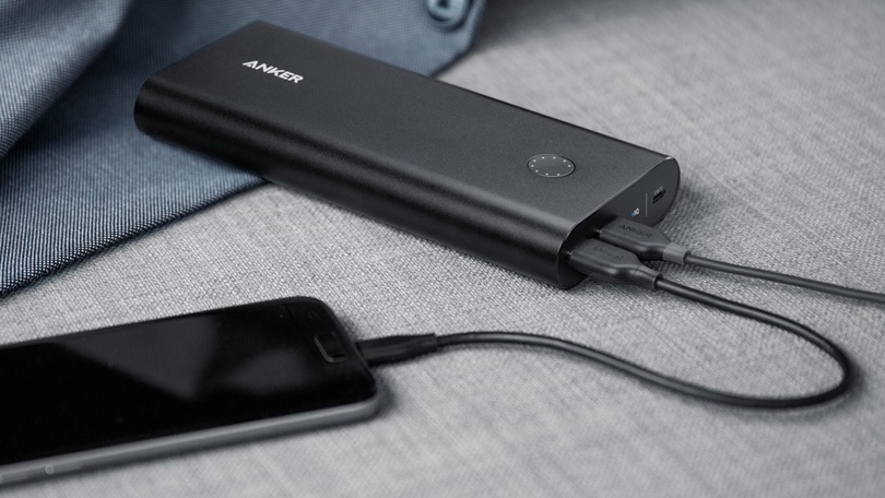 Husband enjoying his Portable Charger Christmas gift - dateyourspouse.com An affordable Christmas gift idea that your man will love | The Dating Divas