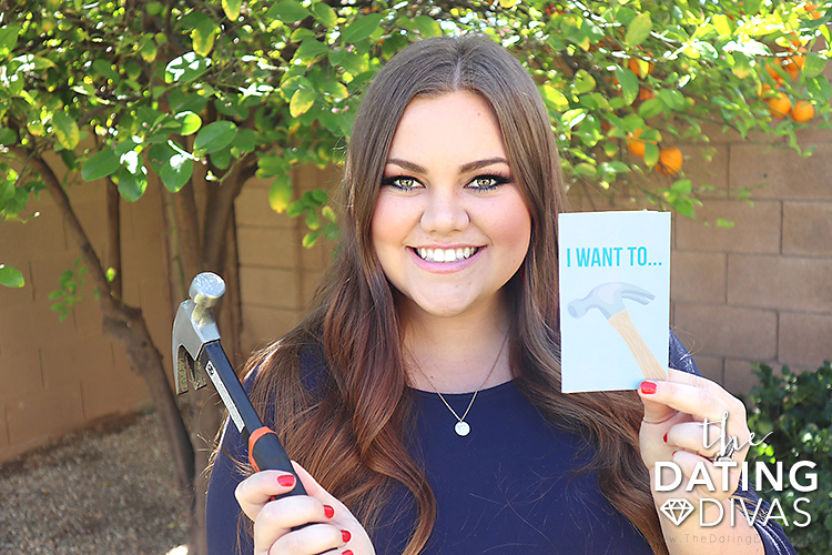 A girl gifting her husband sexy love notes for Christmas - dateyourspouse.com A woman holding sexy love notes for her husband | The Dating Divas