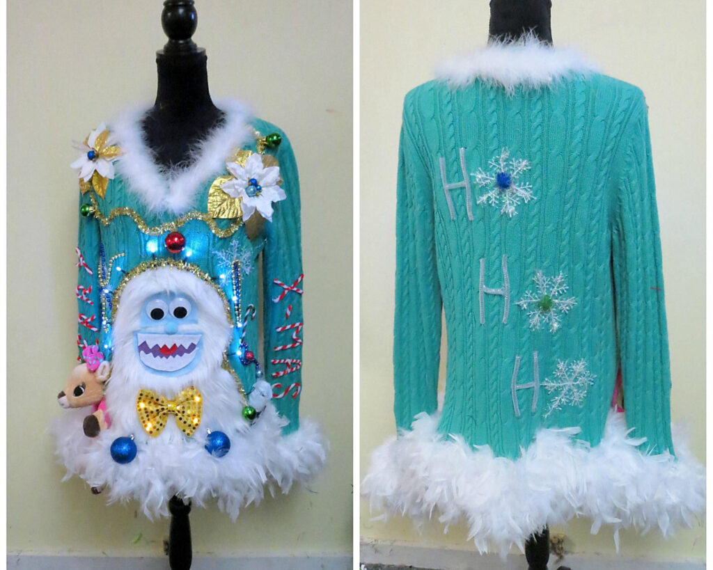 Ugly Christmas sweater that is yeti-themed and has a boa - www.theDatingDivas.com Yeti-Themed Ugly Christmas Sweater Idea | The Dating Divas