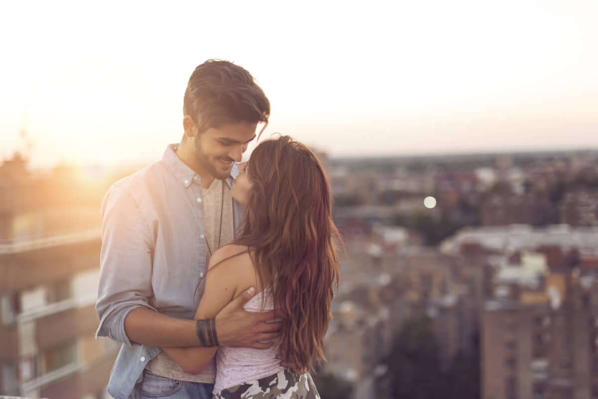 A list of "Reasons Why I Love You" to make a sweet gift for your spouse - dateyourspouse.com Couple happily in love and sharing reasons why they love each other | The Dating Divas