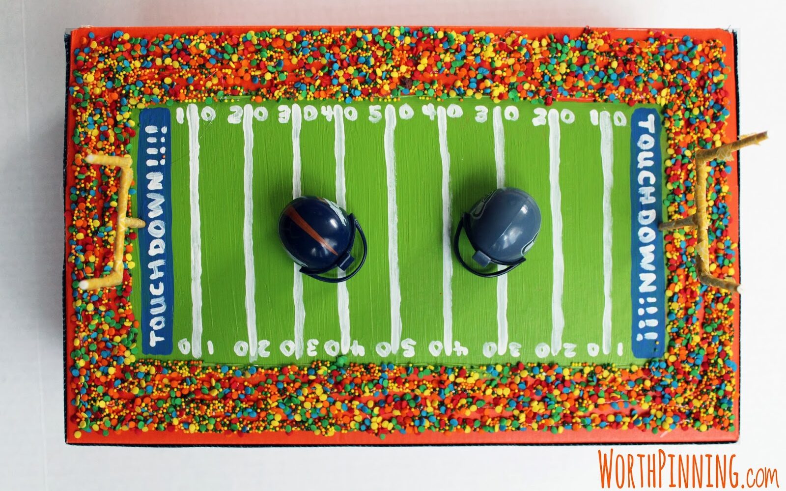 Football field Valentine's Day themed box - thedatingdivascom.bigscoots-staging.com Bright football field themed box with football helmets on top for Valentine's Day | The Dating Divas