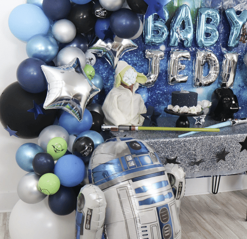 Star Wars Themed Baby Shower - dateyourspouse.com Baby Jedi balloons are backdrop for baby shower | The Dating Divas
