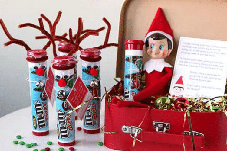 Elf on the shelf with m&m tube crafted into a reindeer | The Dating Divas