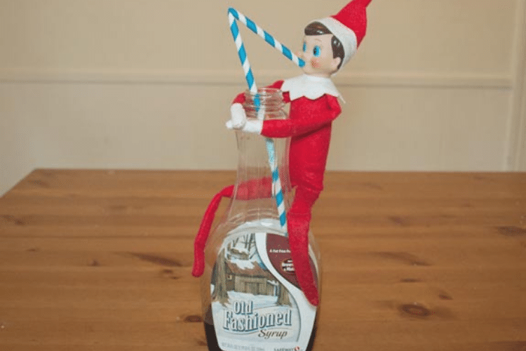 Elf on the shelf drinking syrup | The Dating Divas