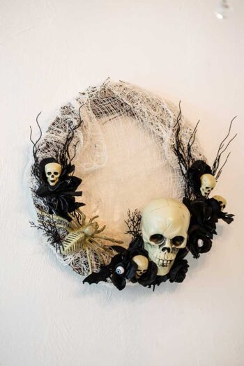 Spooky Skull Wreath Decoration - dateyourspouse.com How to make a DIY Halloween wreath | The Dating Divas