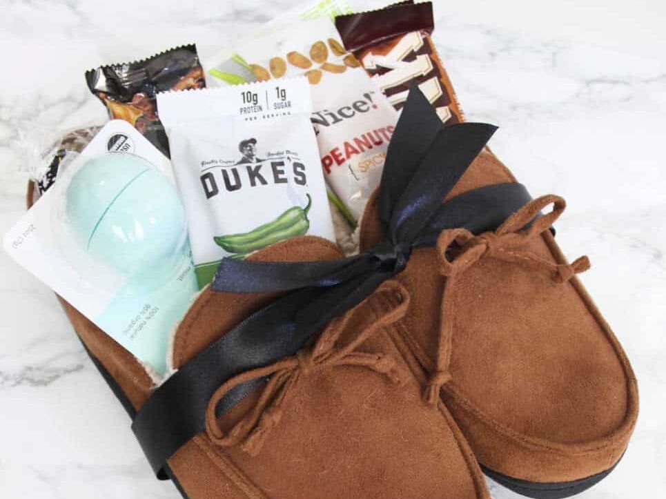 Gift basket for men idea: slippers full of treats | The Dating Divas