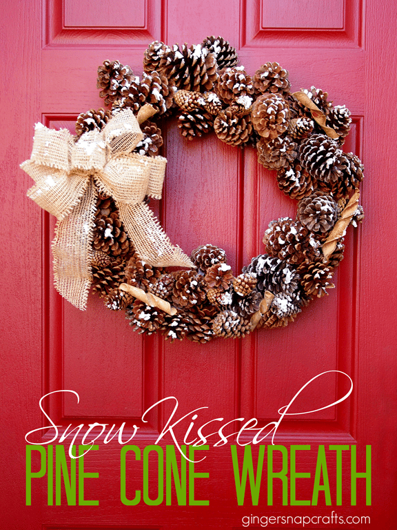 We love the look of this Snow Kissed Pine Cone Christmas wreath! | The Dating Divas