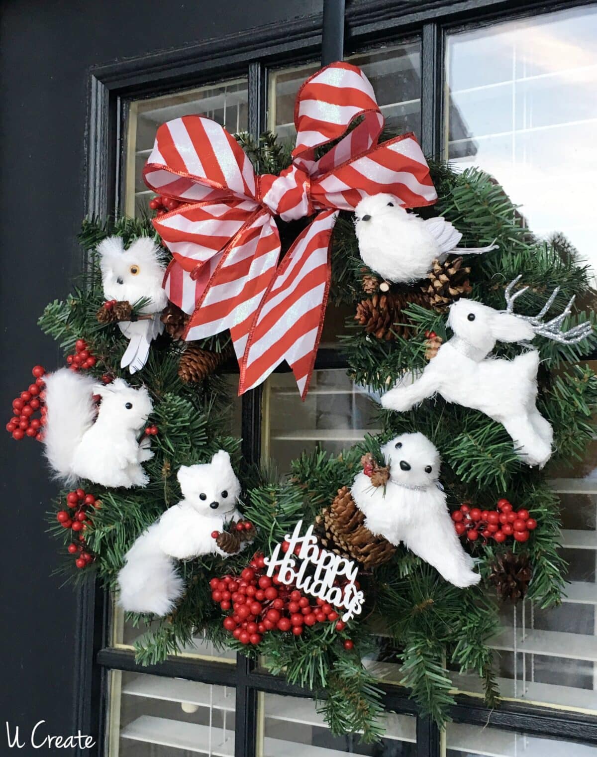 We love how you can completely customize this DIY ornament Christmas wreath! | The Dating Divas