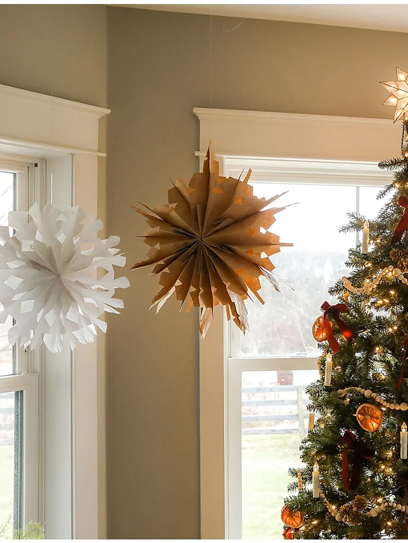 We love these paper bag stars as easy Christmas crafts for kids! | The Dating Divas