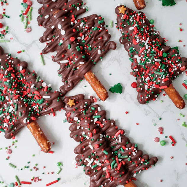 Chocolate-covered pretzels make great Christmas desserts to serve at a party. | The Dating Divas