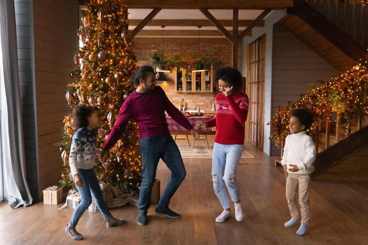 This list has family-friendly Christmas songs to enjoy all season long! | The Dating Divas