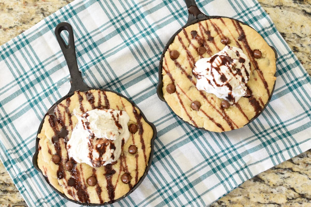 Homemade Pizookie skillet cookie topped with vanilla ice cream for an at-home date night.